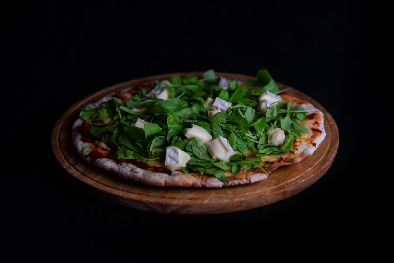 Pizzas a la piedra cocinadas a las brasas